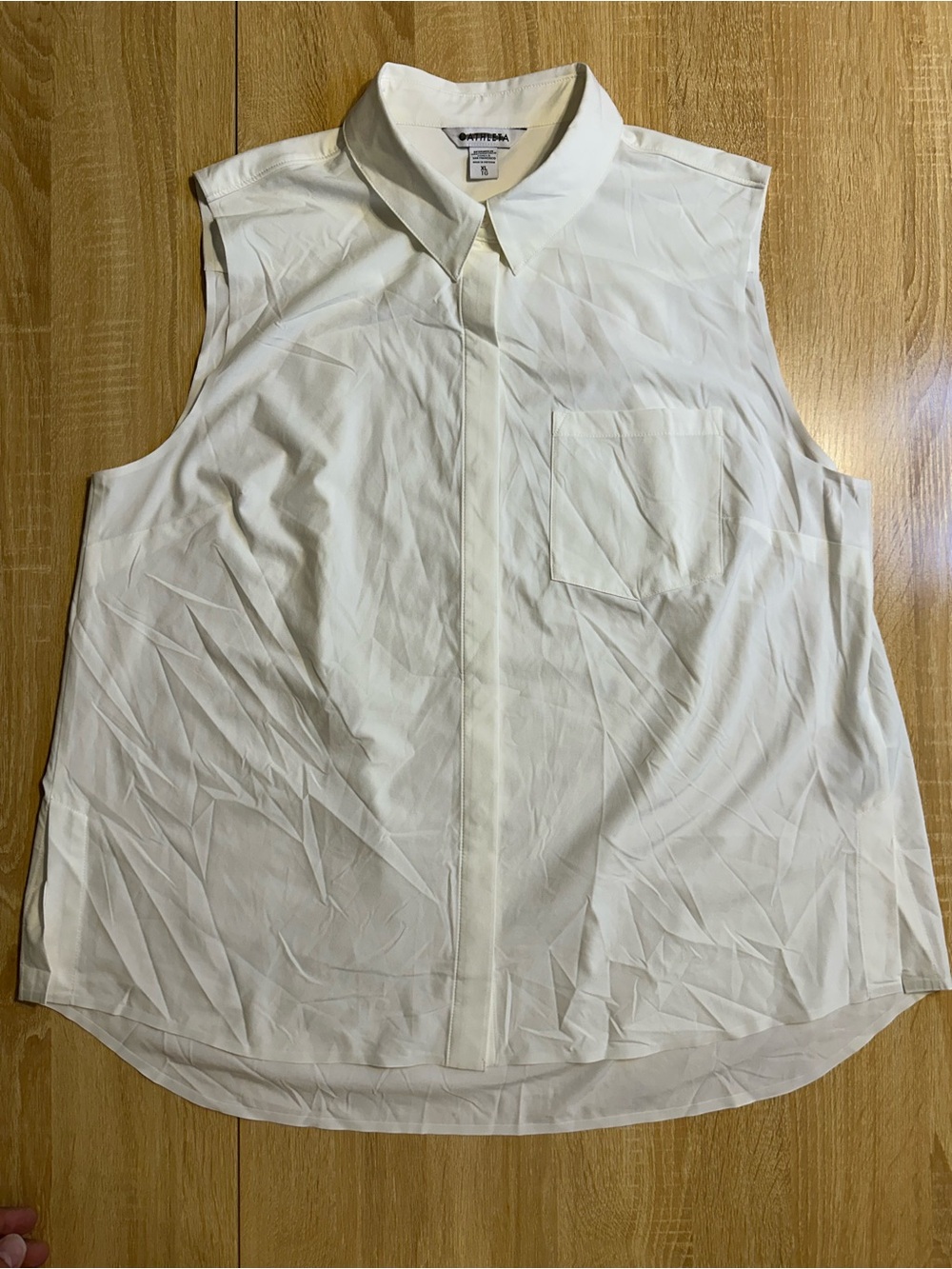 Athleta Sleeveless Button-Down Shirt in Off-White